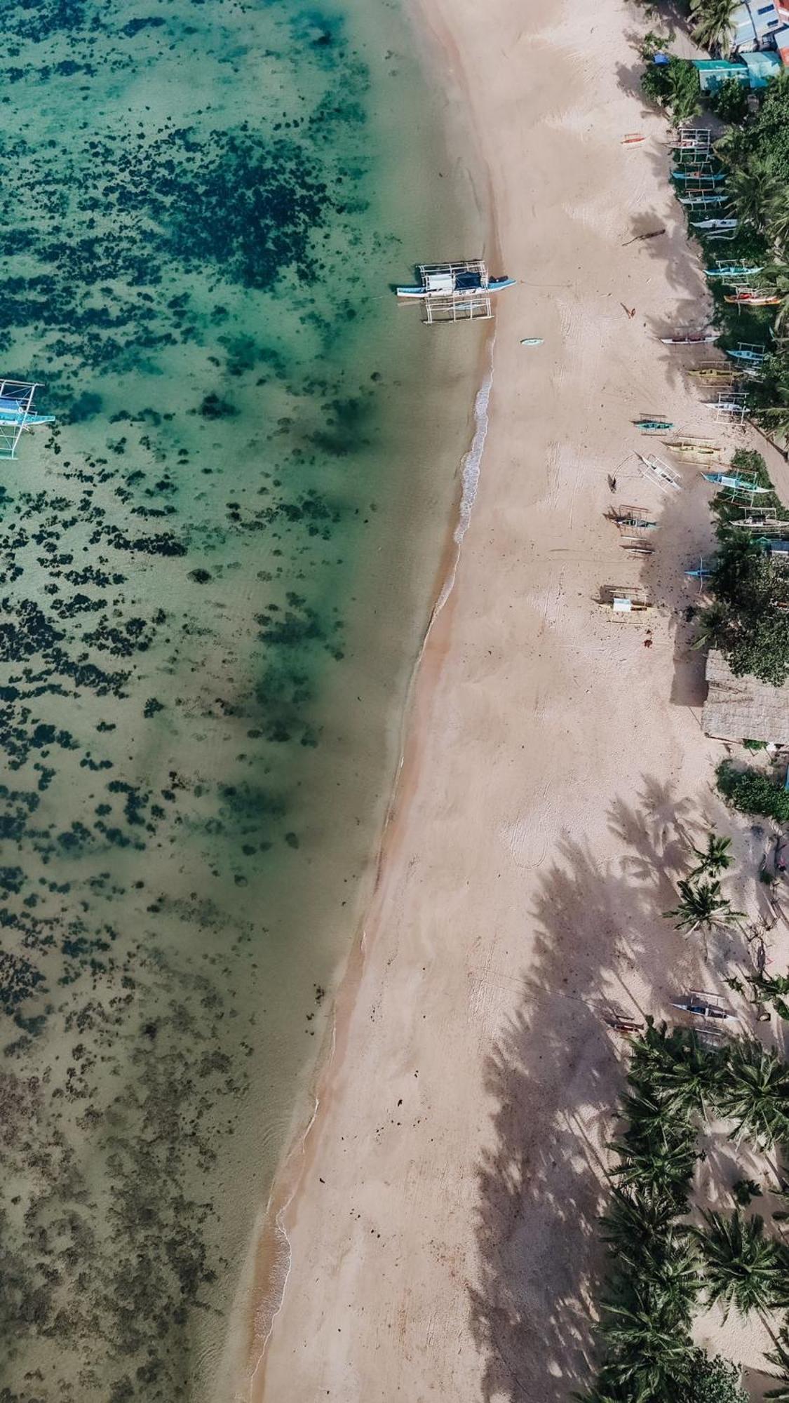 Lazy Juan Beach House Nacpan El Nido Bagian luar foto